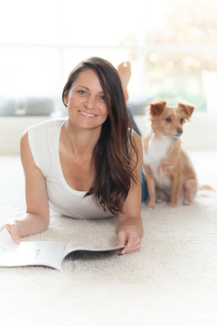 Becky Jones at home with her dog